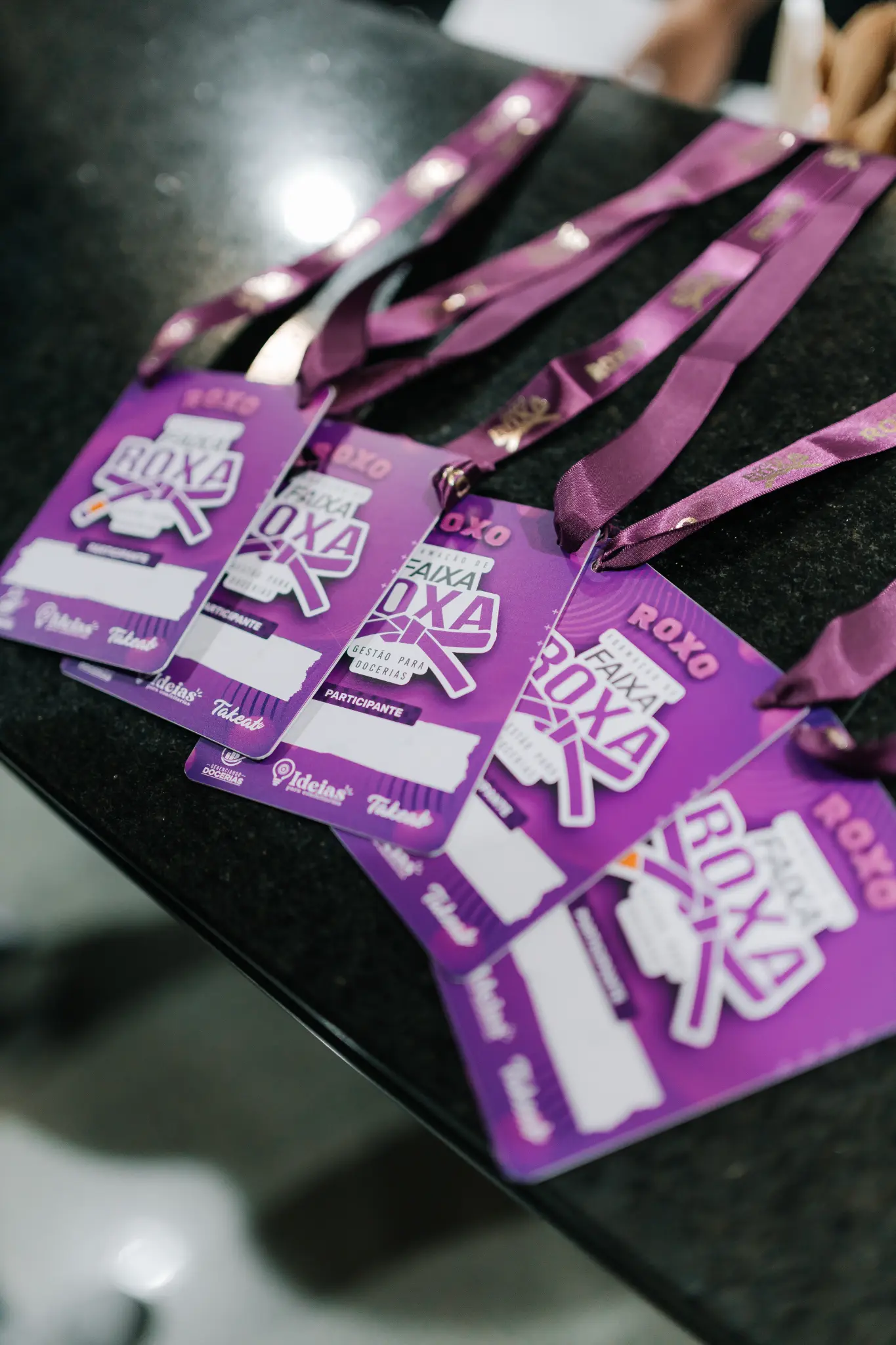 Crachás Faixa Roxa